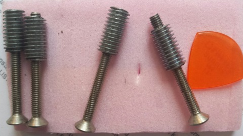 Allen head countersunk screws and steel threaded inserts for the neck