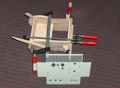 Drilled chassis and drying cabinet